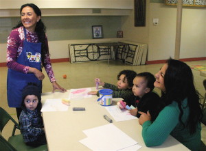 Caregivers / instructors teach early childhood learning skills courtesy of the Arizona Kith and Kin Project.