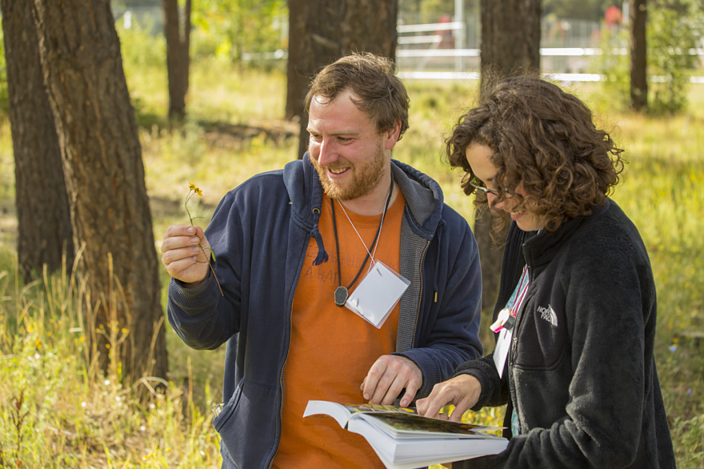 Chelsea Silva, AmeriCorps VISTA Watershed Stewardship Aide with Friends of the Rio de Flag and the City of Flagstaff, and Mike Rotter, PHD biology student at NAU identifying plants at the Pond.